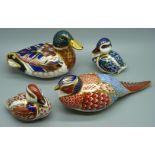 Four Royal Crown Derby paperweights, duck, two ducklings and a pheasant, all with silver stoppers