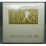 An Elvis Presley The EP Collection of EPs in a vinyl binder