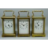 Three brass and four glass sided carriage clocks, two with dials a/f
