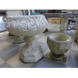 Two concrete garden urns