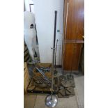 A large quantity of vintage mid 20th Century steel shop display stands