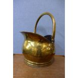 A Victorian brass coal scuttle