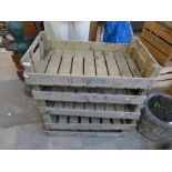 Five wooden potato crates