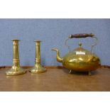 A Victorian brass kettle by James Clews, Birmingham and a pair of brass candlesticks