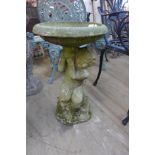 An early 20th Century concrete fountain top figural Putti water feature