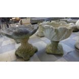 A concrete bird bath and a concrete water feature