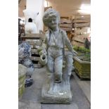 A concrete figural water feature