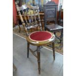 A Victorian walnut penny seat chair