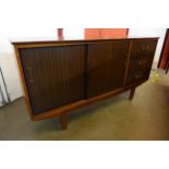 A teak and tola wood sideboard