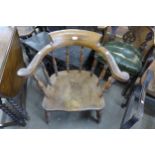 A Victorian elm smokers bow chair