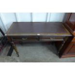 A Victorian mahogany two drawer writing table