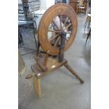 A vintage wooden spinning wheel