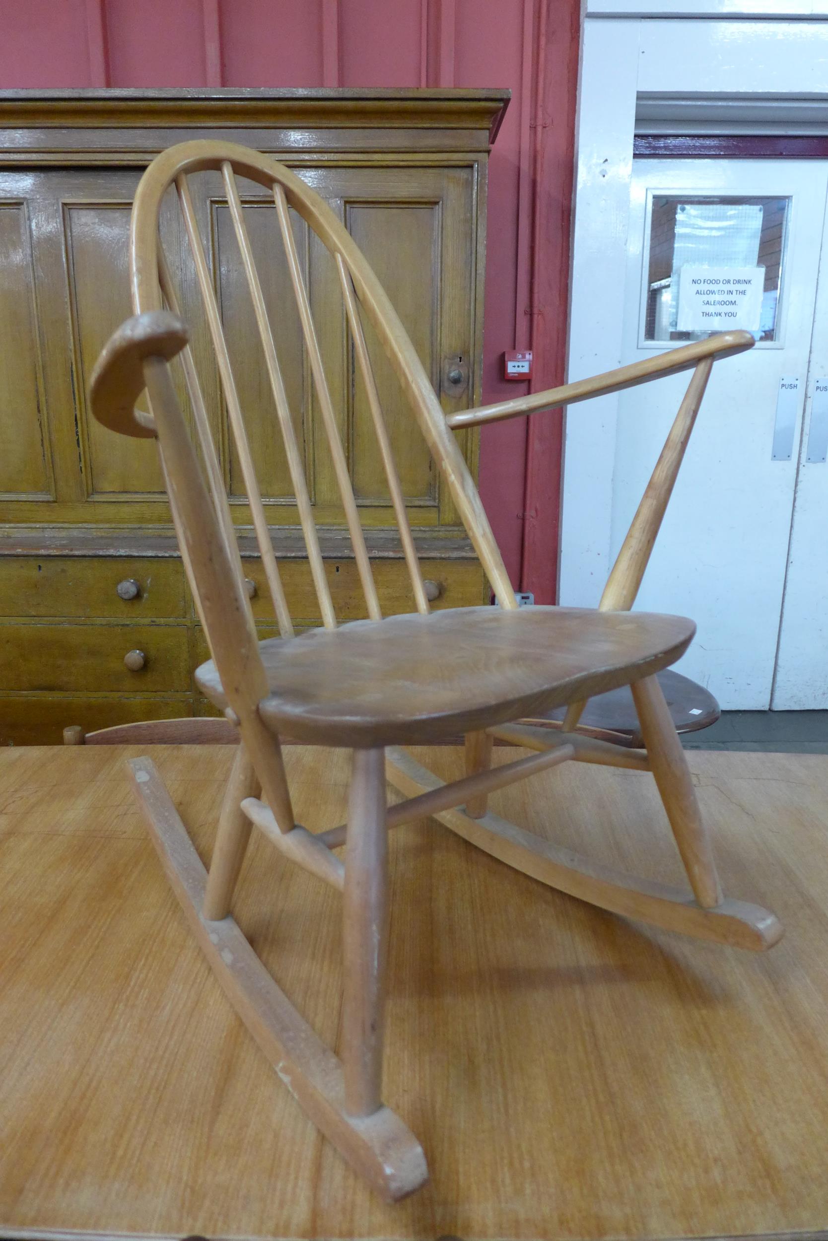 An Ercol Blonde elm and beech Quaker rocking chair