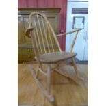 An Ercol Blonde elm and beech Quaker rocking chair