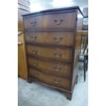 A mahogany serpentine chest of drawers