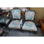 A pair of Victorian Aesthetic Movement ebonised and fabric upholstered chairs