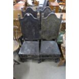 A set of four 19th Century Spanish carved oak and embossed leather chairs