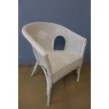 A white wicker armchair