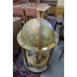 A terrestrial globe cocktail cabinet/trolley