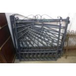 A set of three painted wrought steel gates