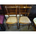 A pair of Victorian beech bedroom chairs