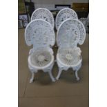 A set of four painted cast aluminium garden chairs