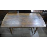 An Ercol elm and beech CC41 model utility refectory table