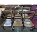 A set of six Victorian elm and beech kitchen chairs