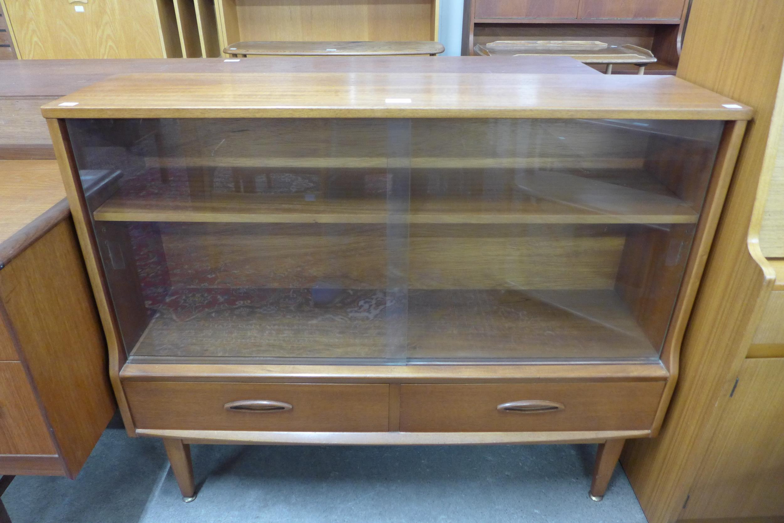 A Jentique teak bookcase