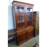 A mahogany display cabinet