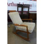 A Danish teak rocking chair