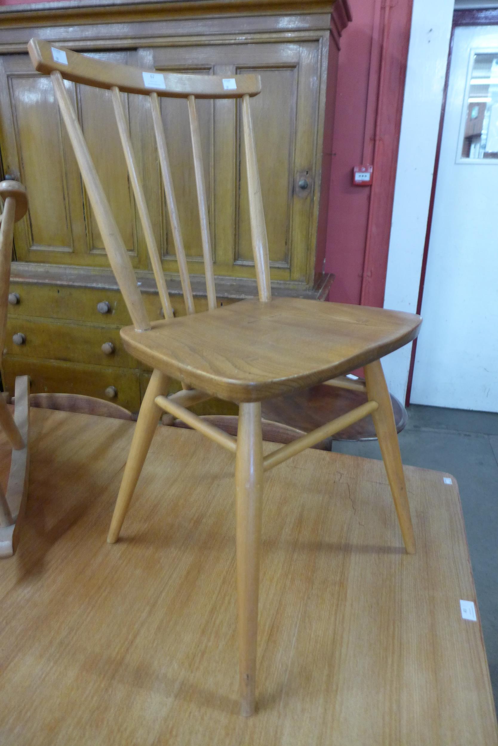 An Ercol Blonde elm and beech 391 model chair