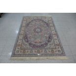 A blue ground Kashmir rug, 204 x 136cms