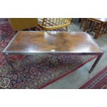 A Howard Miller rosewood and chrome coffee table *Accompanied by CITES A10 certificate, no. 615502/