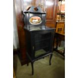 A Victorian ebonised side cabinet