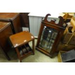 A mahogany wall hanging corner cabinet and a magazine stand