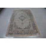 A salmon ground Kashmir rug, 229 x 156cms