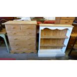 A pine chest of drawers and a bookcase