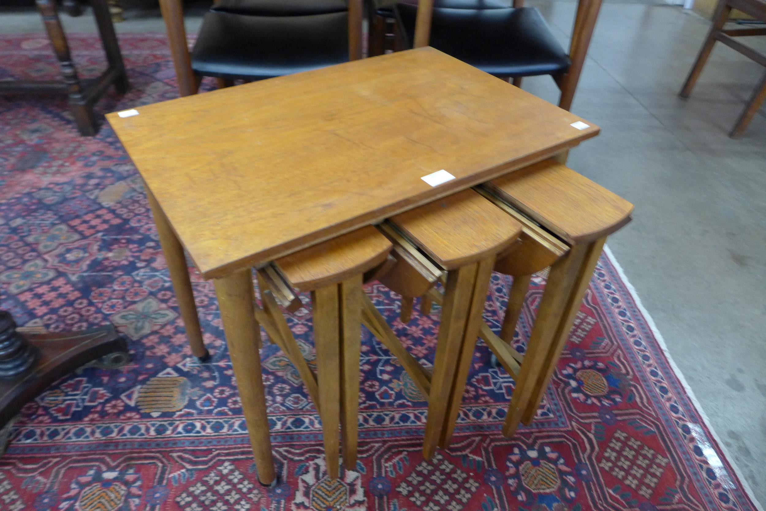 A Danish Poul Hundevad teak nest of tables