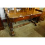 A Regency rosewood two drawer library table