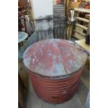 A large galvanised steel lidded compost bin