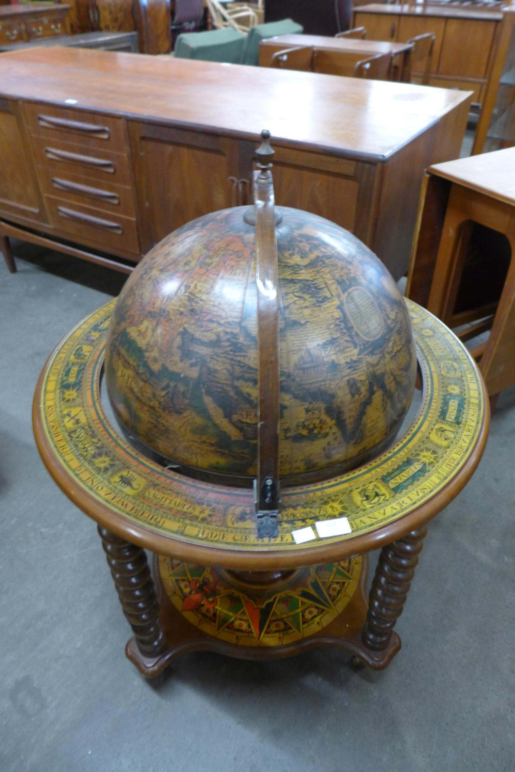 A terrestrial globe cocktail cabinet/trolley