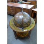 A terrestrial globe cocktail cabinet/trolley