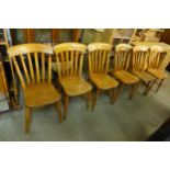 A set of six Victorian elm and beech kitchen chairs