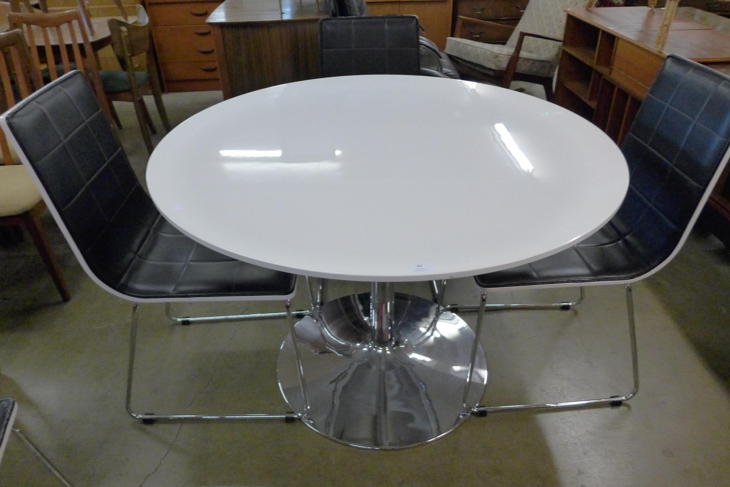 A chrome and white laminate circular table, four chairs and a trolley - Image 3 of 3