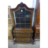 A Dutch marquetry inlaid mahogany side cabinet