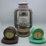 Two retro Bakelite Rototherm thermometers and a Tropic hurricane lamp