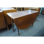 A G-Plan teak drop-leaf table