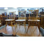 A set of three Ercol Blonde elm and beech 608 model chairs