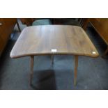 An Ercol Blonde elm and beech side table